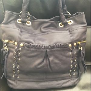 Gorgeous B. Makowsky bag in a deep plum color.